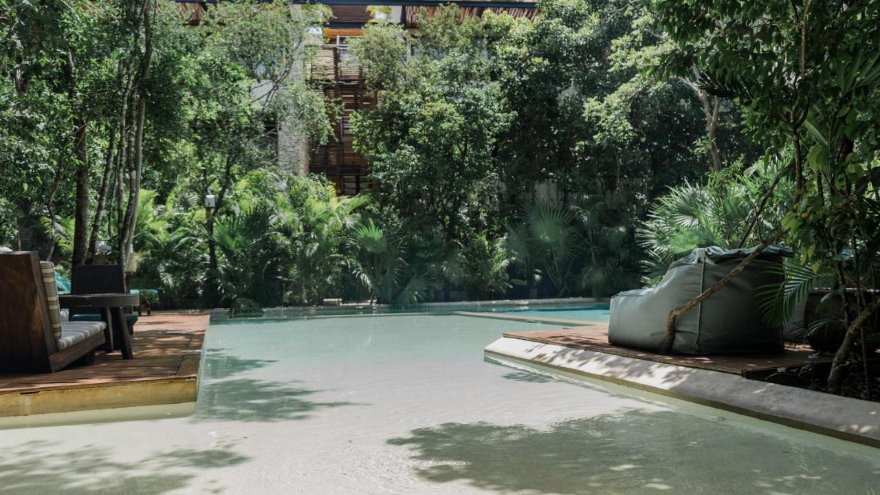 Copal Tulum Hotel Extérieur photo The swimming pool at the hotel