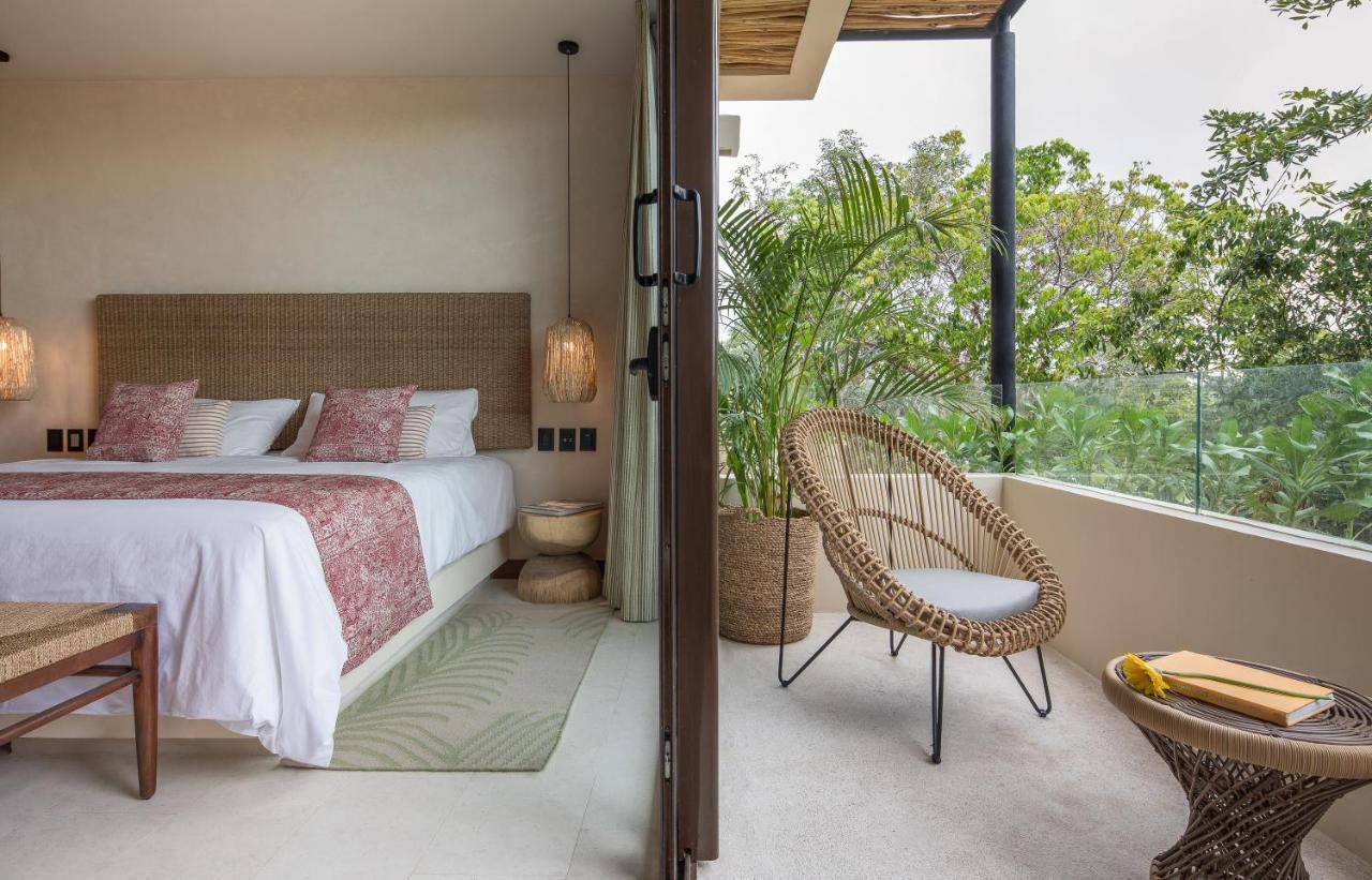 Copal Tulum Hotel Extérieur photo A bedroom at the hotel